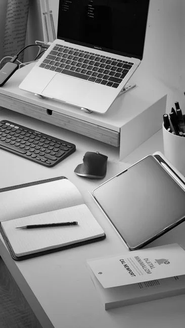 person-in-blue-long-sleeve-shirt-sitting-beside-black-laptop-computer-9gpkrsbgmc